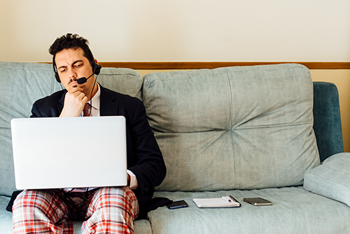 Man on couch with laptop